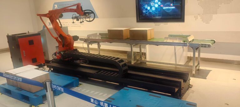 Qianjiang Robot ground-rail palletizing system with 4-axis robot